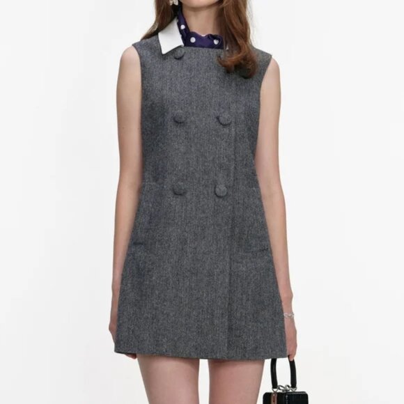 Self-portrait A blue scarf paired with a grey mini-dress with delicate details.
